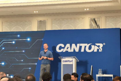Tether's Paolo Aldoino is cheered at Cantor Conference for the stablecoin publisher saying "we've gone through hell"