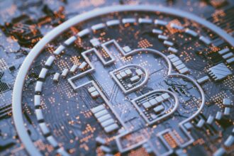 Bitcoin logo on circuit board, illustration